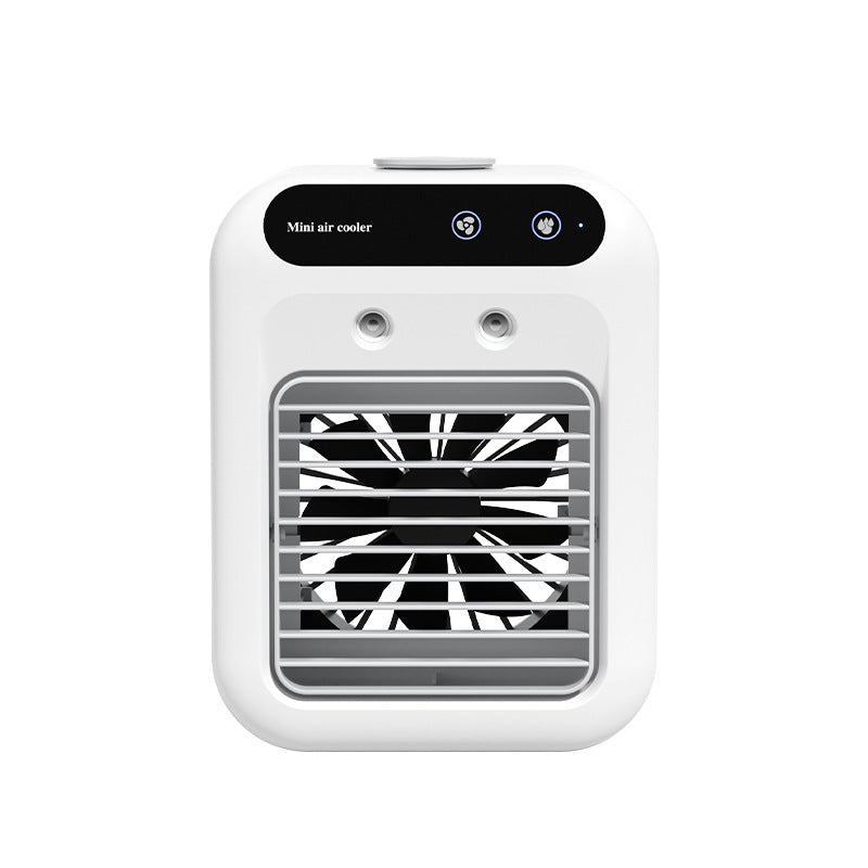A compact white portable air conditioner fan with a touchscreen interface, emitting a cool mist, placed on a wooden surface.