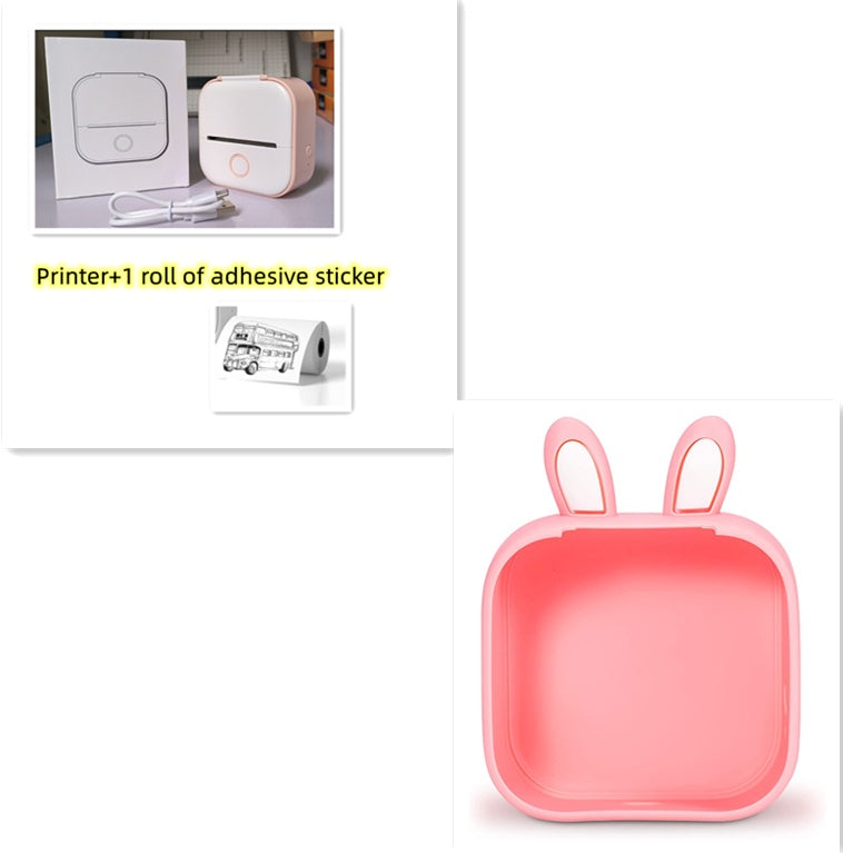 Small printer with adhesive sticker roll and pink square object on a white background