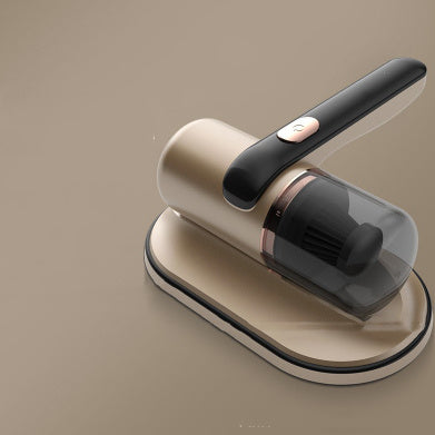 A handheld electric UV mite remover with a pink and gray color scheme being used on a fabric surface, showcasing its UV sterilization function.