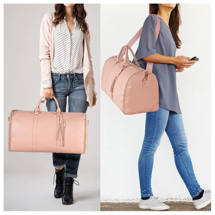 Two people carrying pink duffel bags against a neutral background