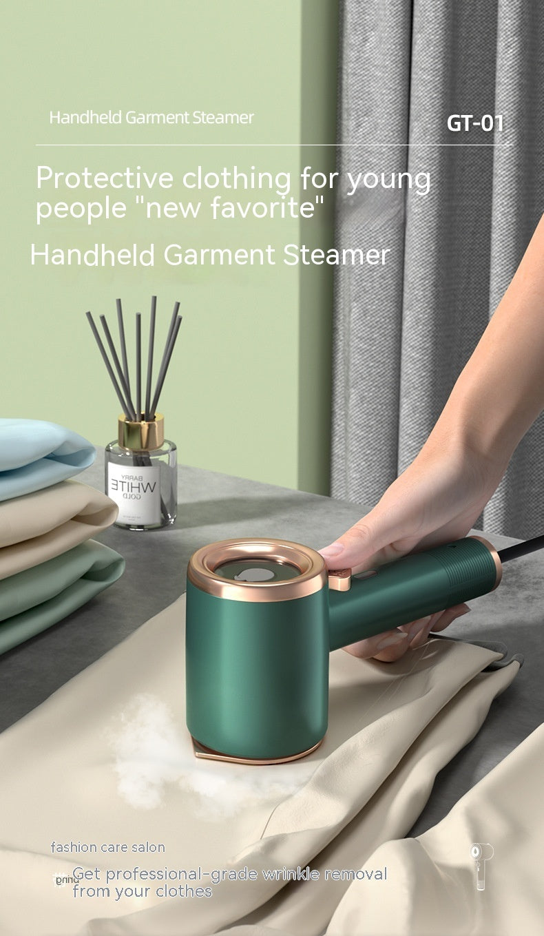 Handheld garment steamer being used on a fabric with a diffuser and fabric in the background.