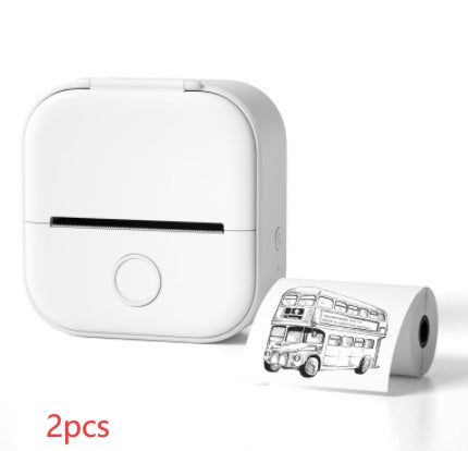 White portable printer with a roll of paper featuring a bus design on a white background
