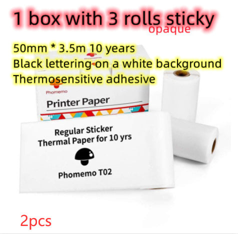 Phomemo printer paper with three rolls on a white background, featuring text about dimensions and durability.