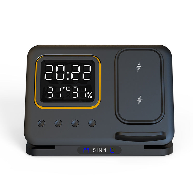 Black electronic device with digital display and charging indicator on a white background