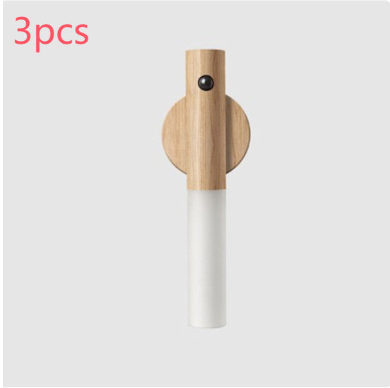 Wooden and white cylindrical product on a light gray background with '3pcs' text.