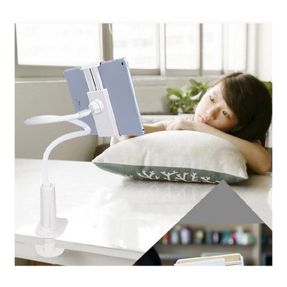 Child using a tablet stand on a desk with a tablet device