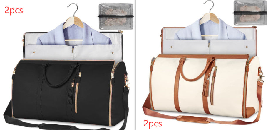 Two black bags with hangers and shirts on a white background