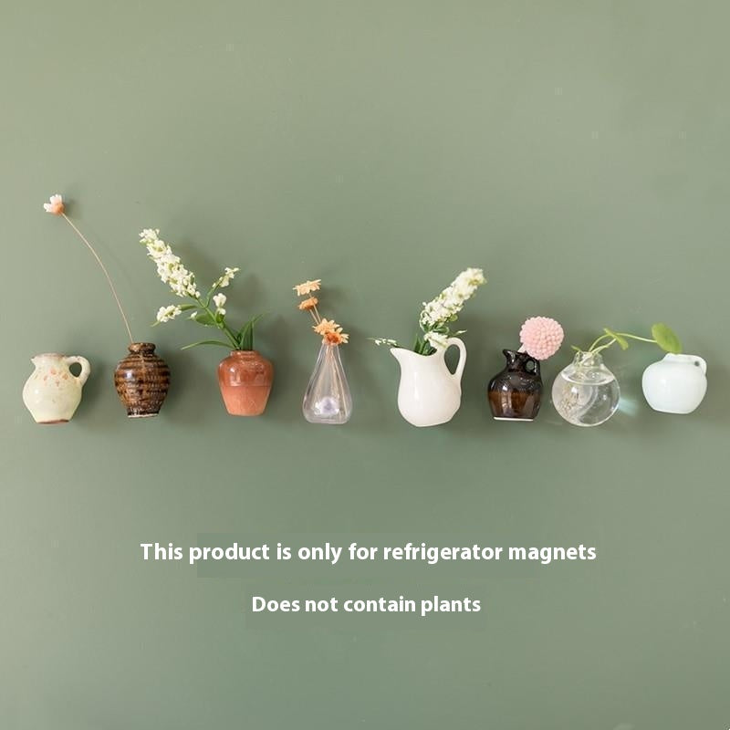 Decorative vases with plants on a green wall, with text indicating product exclusivity.