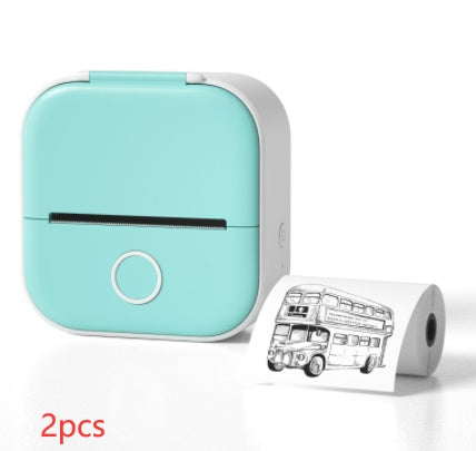 Turquoise portable printer with a roll of paper featuring a bus illustration on a white background