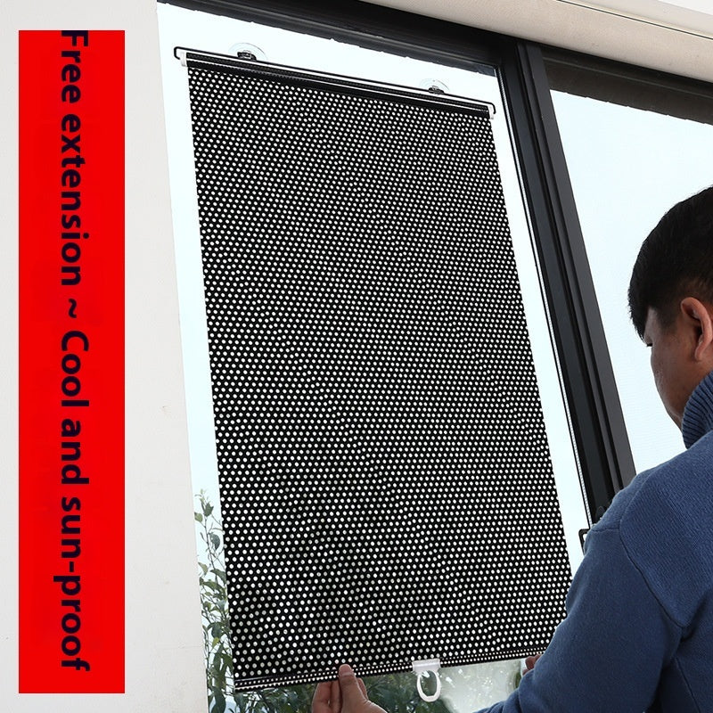 Person installing a black window screen with text on a red background