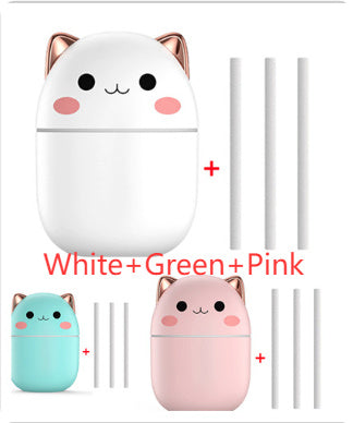 Three cute animal-shaped USB drives in white, green, and pink on a white background.