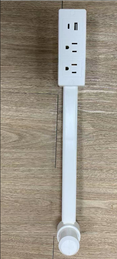 White extension cord with multiple outlets on a wooden surface