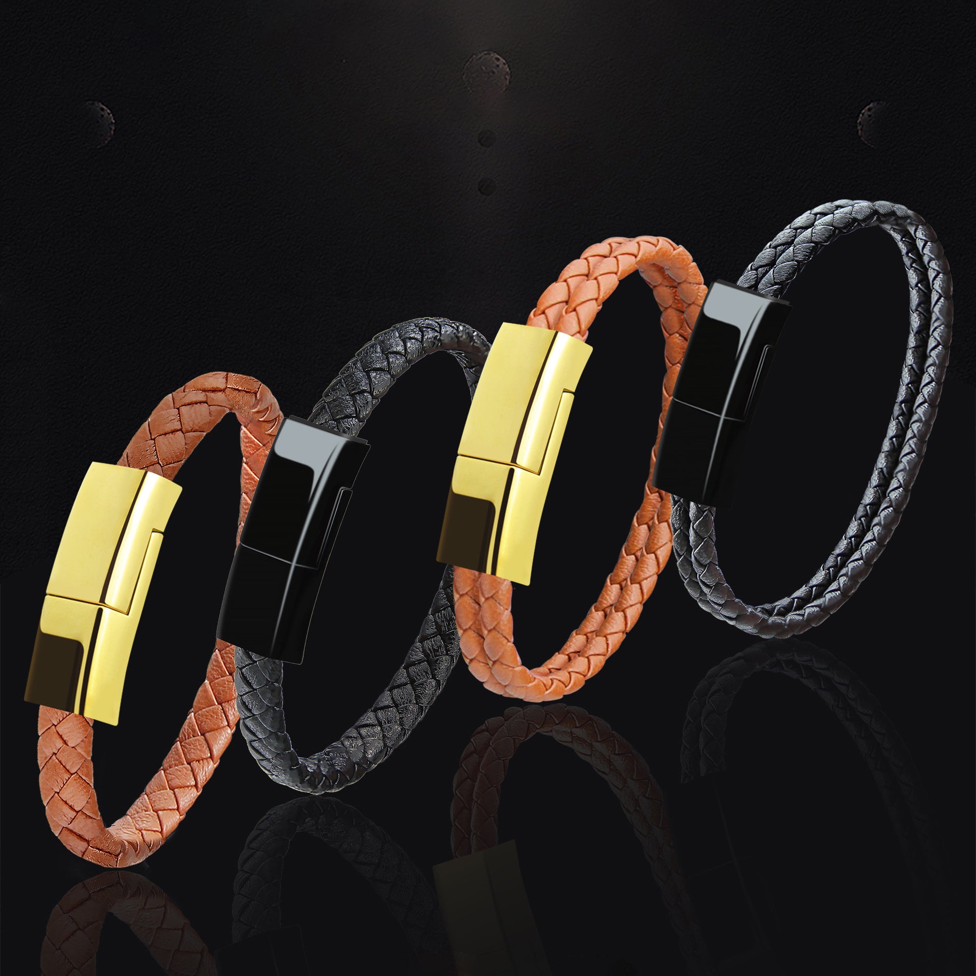 Four braided leather bracelets with gold and black magnetic clasp on a reflective black surface.