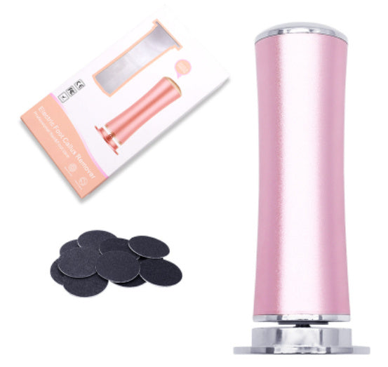 Electric foot callus remover device shown in pink color, alongside a visual depiction of its use on a foot, and a close-up of the device's head showing the replacement sandpaper.
