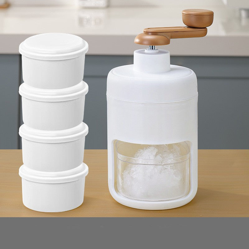 A person holding a bowl of cereal topped with fruits next to a white hand block shaving machine and a small white ice maker.