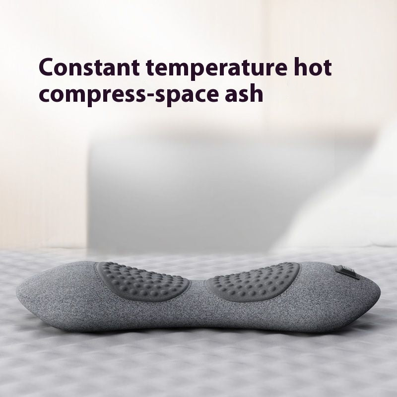 Gray heating pad on a bed with text 'Constant temperature hot compress-space ash' above it.