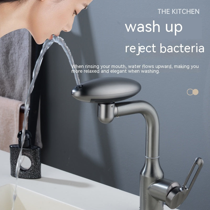 Person rinsing mouth with water from a kitchen faucet, emphasizing hygiene.