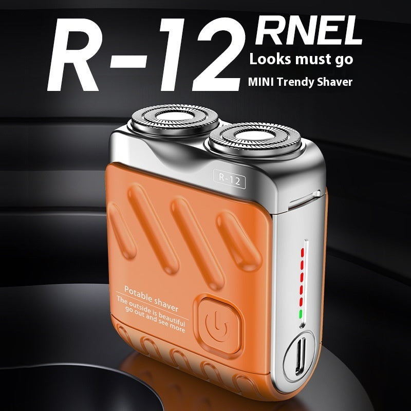 Orange and silver shaver with 'R-12 RNEL' branding on a dark background