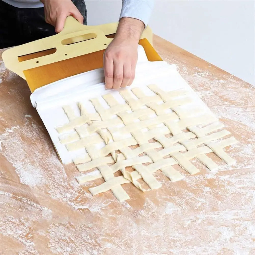 Dough lattice tool being used on a wooden surface with flour.