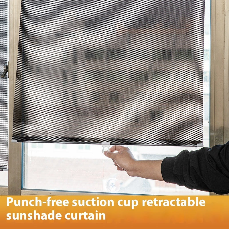 Retractable sunshade curtain with punch-free suction cup mechanism being used on a window.