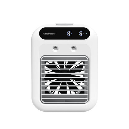 A compact white portable air conditioner fan with a touchscreen interface, emitting a cool mist, placed on a wooden surface.