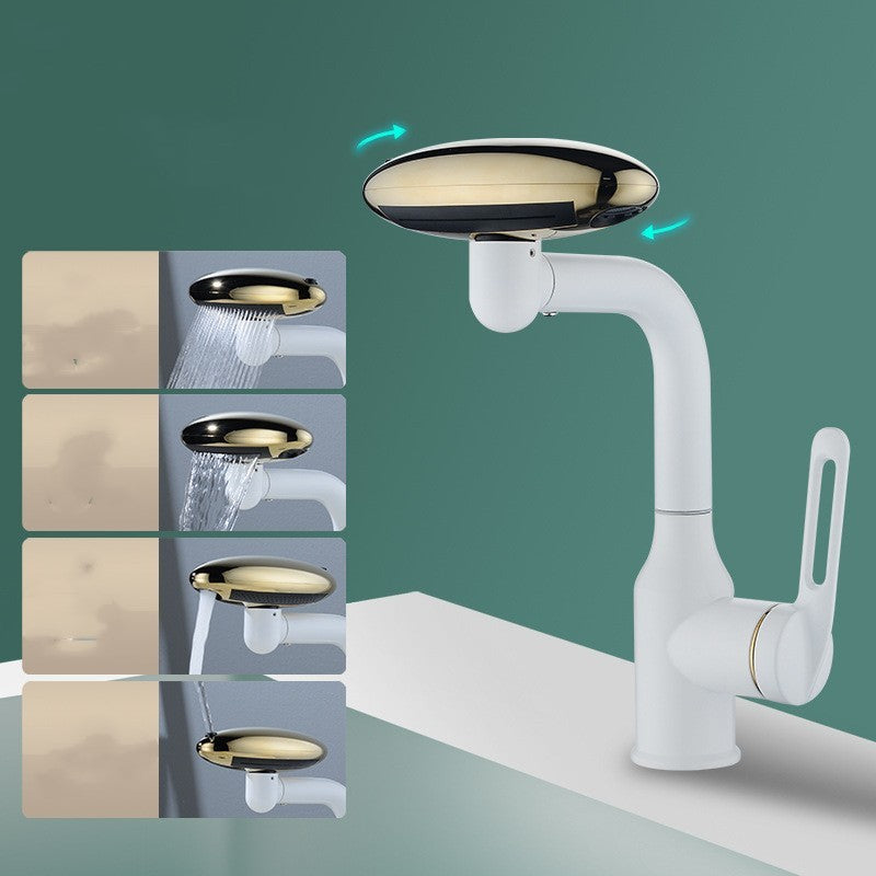 White kitchen faucet with gold and bronze shower heads on a green background