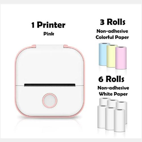 Pink printer with colorful and white paper rolls on a white background
