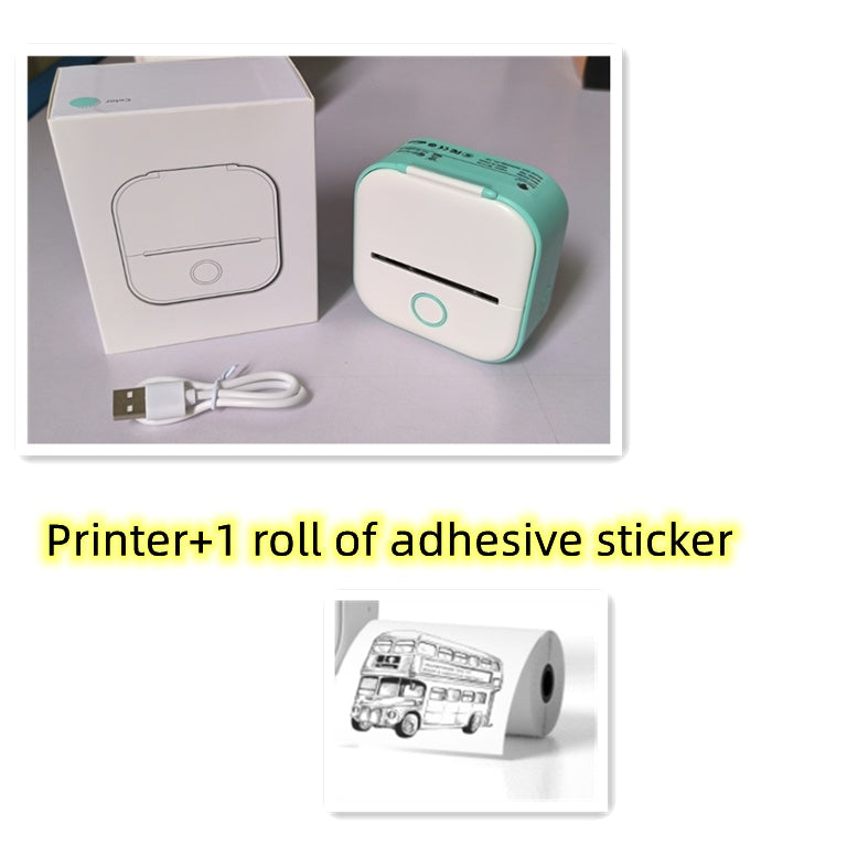 Small printer with packaging and adhesive sticker roll on a white background