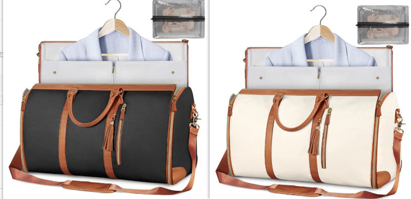 Black and white travel bags with hangers and shirts on a white background