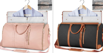 Two travel bags, one pink and one black with brown accents, on hangers with clothes inside.